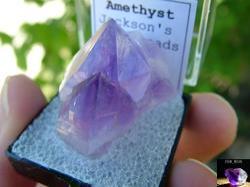 This Georgia amethyst crystal is shown mounted in a perky box